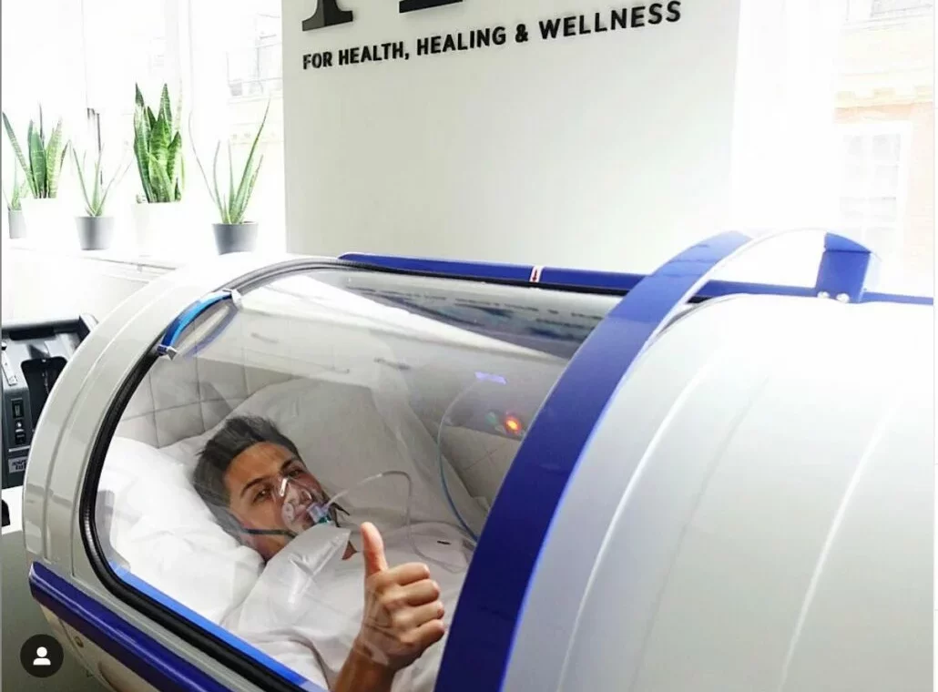 man inside a treatment machine